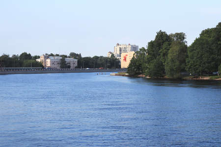 Big Nevka river embankment cityscape skyline. Elagin island. Saint-Petersburg architecture. Surfers...