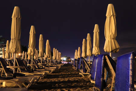 Closed beach umbrellas. Night long exposure. Alanya. Turkey.の写真素材