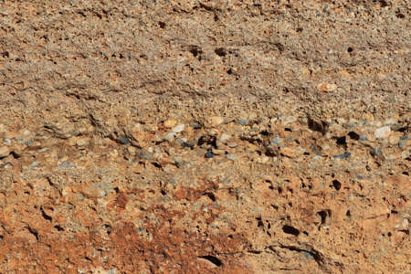 Shell rock wall texture. Coquina stone background. Bedesten Alanya fortress wall. Turkey.の写真素材