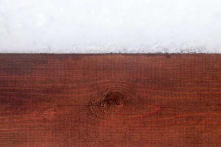 Wood plank with snowdriftの写真素材
