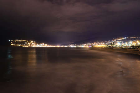 Alanya city night lights exposure. Sea view. Turkey travel background.の写真素材