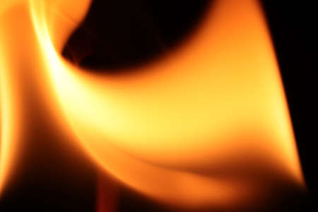 Burning flames background. Blaze fire texture. Glowing dangerous burl light backdrop. Danger blazing...