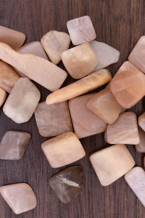 Sunstone rare jewel texture on white light background.