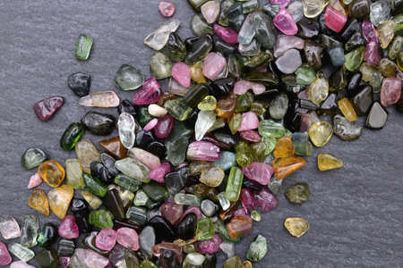 Tourmaline rare jewel stones texture on dark backgroundの写真素材
