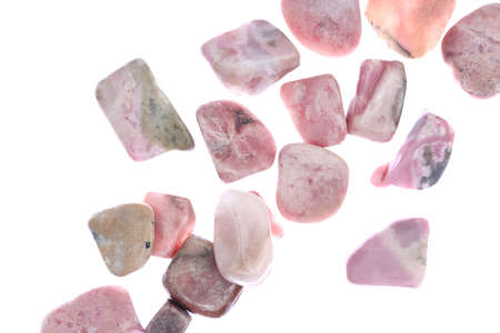 Rhodochrosite heap jewel stones filled texture on black background