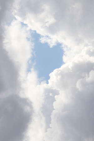Cloudy heaven skies beautiful panorama. Vertical portrait orientation.の写真素材