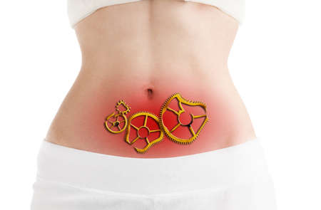 Slim Body of Young Woman with Abdominal Pain. White Backgrownd.