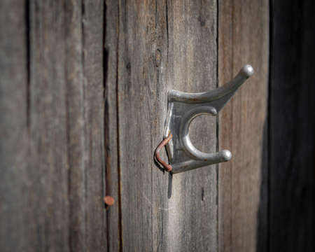 an old fashioned hook in the wall