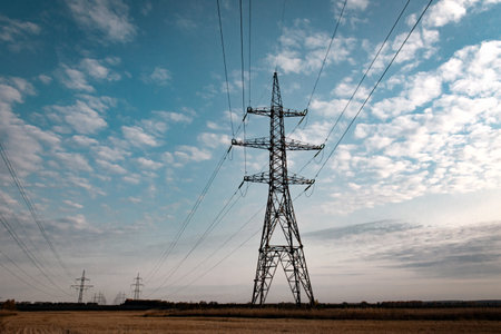power lines on the sky background in evening