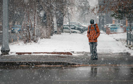 26 October 2020, Tomsk, Russia: teenager stays on streetのeditorial素材