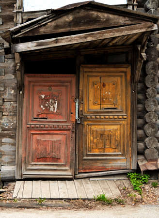 1st of May 2016, Russia, Tomsk, old fashioned door of wooden houseのeditorial素材