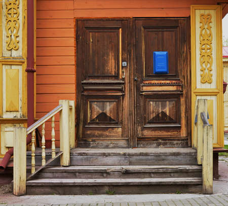 1st of May 2016, Russia, Tomsk, old fashioned door of wooden houseのeditorial素材
