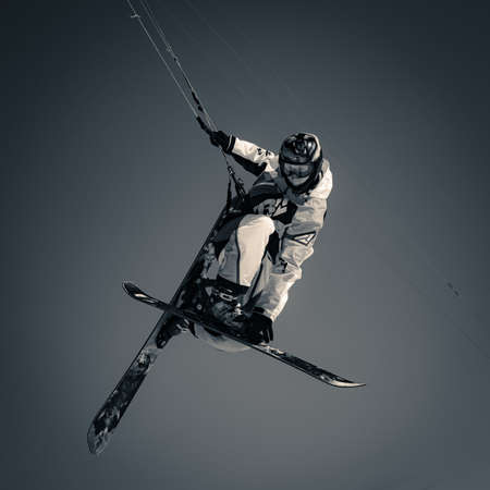 12 of March 2017, Russia, Tomsk, kiter jump up within kiteのeditorial素材