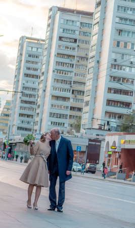 7th of October 2017 , Russia, Moscow, Man and woman walk and kiss on the streetのeditorial素材