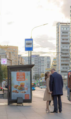7th of October 2017 , Russia, Moscow, Man and woman walk and kiss on the streetのeditorial素材