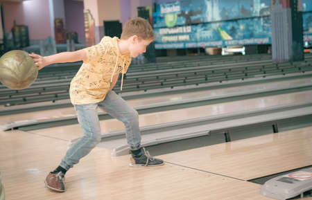 22nd of January 2022, Russia, Tomsk, children play bowling lifestyle coloredのeditorial素材