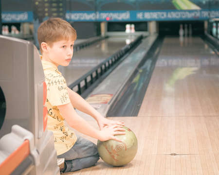 22nd of January 2022, Russia, Tomsk, children play bowlingのeditorial素材