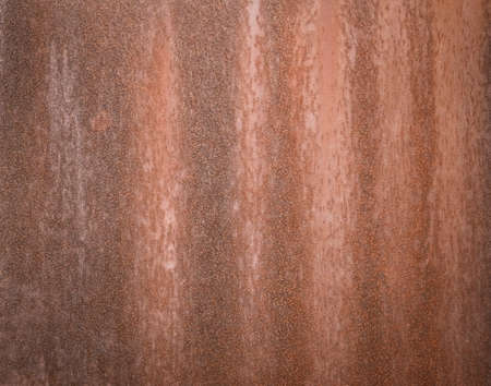 The rustic brown background of old iron patternの写真素材