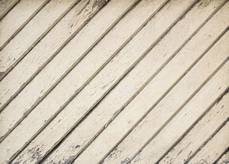 The textured wooden backdrop aged rough lightの写真素材