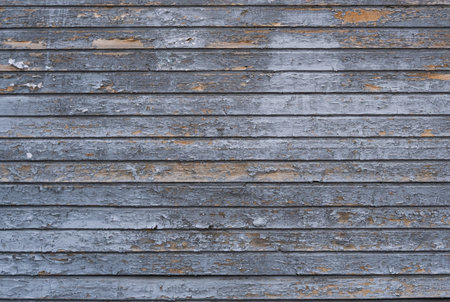 The textured wooden backdrop aged rough blue freyの写真素材