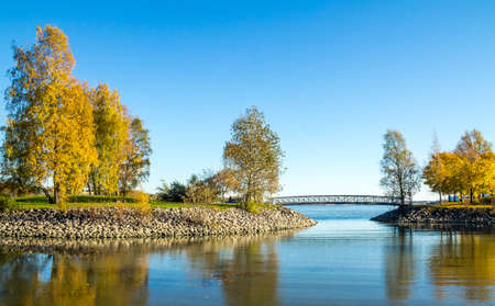 Peaceful view of the ocean bay with a small pedestrian bridge