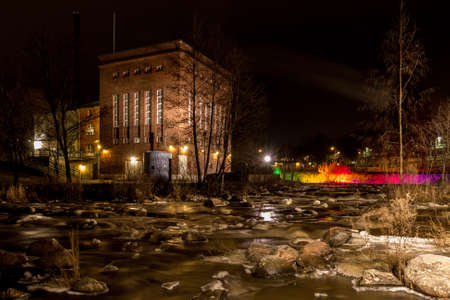 Old factory by the river at night - long exposureのeditorial素材