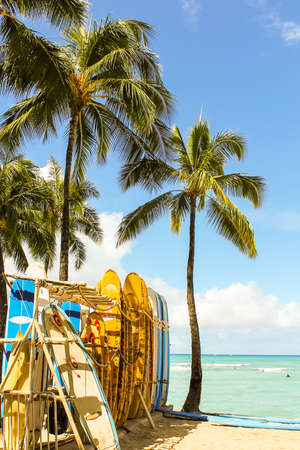 WAIKIKI BEACH, HONOLULU, HAWAII - July 17, 2014. Surfboard rack on the ocean shore in Waikiki Beach, Honoluluのeditorial素材