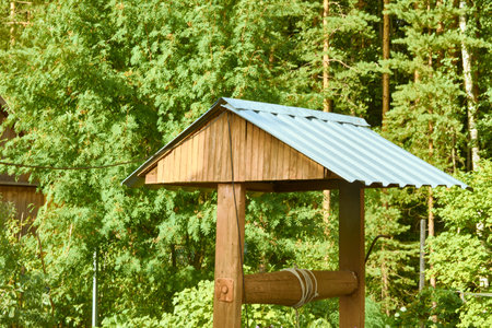 A well for lifting water manually on the street in the villageの写真素材