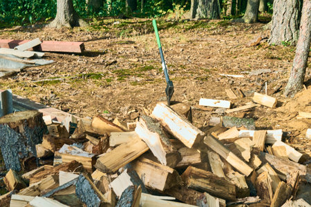 Dry firewood split with an ax on the site for the stove. High quality photoの写真素材