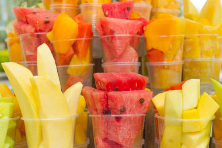 Tropical fruits in containers, typical food of Colombia to sell in the streetsの写真素材