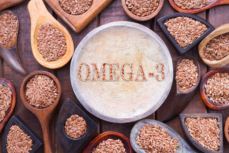 Linseed grains on the table- Linum usitatissimumの写真素材