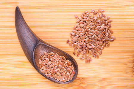 Linseed grains on the table- Linum usitatissimumの写真素材
