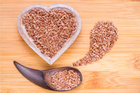 Linseed grains on the table- Linum usitatissimumの写真素材
