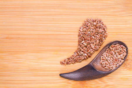 Linseed grains on the table- Linum usitatissimumの写真素材