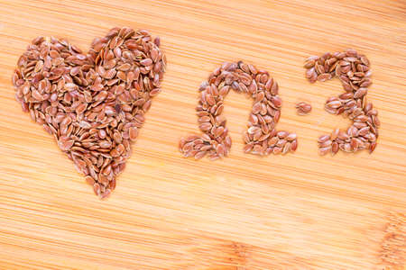 Linseed grains on the table- Linum usitatissimumの写真素材