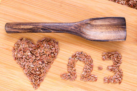 Linseed grains on the table- Linum usitatissimumの写真素材