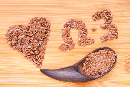 Linseed grains on the table- Linum usitatissimumの写真素材