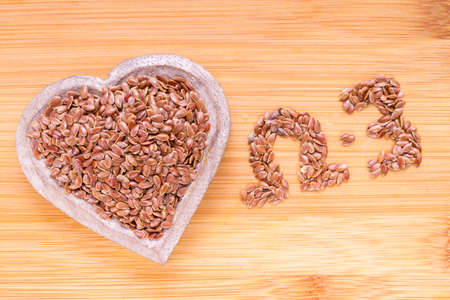 Linseed grains on the table- Linum usitatissimumの写真素材