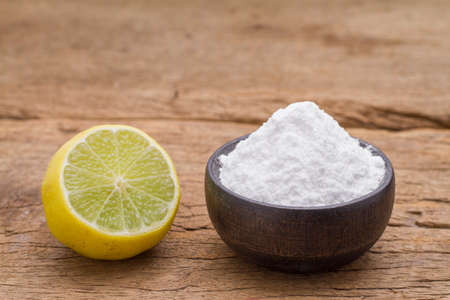lemon and baking soda on the tableの写真素材