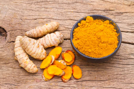 turmeric in bowl on table, top viewの写真素材
