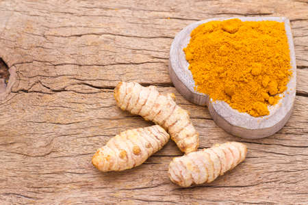 turmeric in bowl on table, top viewの写真素材