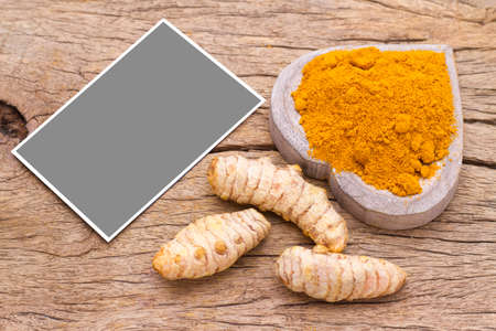 turmeric in bowl on table, top viewの写真素材