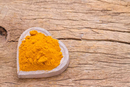 turmeric in bowl on table, top viewの写真素材