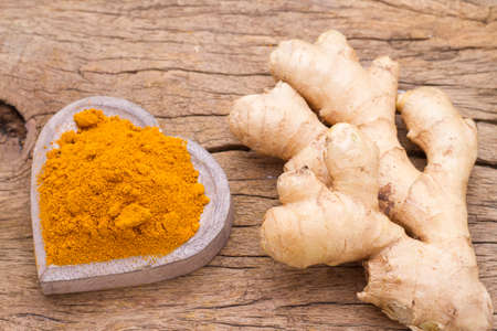 ginger roots and turmeric on the table, top viewの写真素材