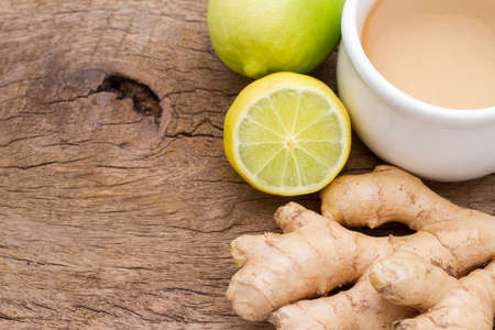 ginger and lemon on the table seen from aboveの写真素材