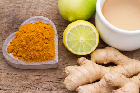 turmeric, ginger and lemon on the tableの写真素材