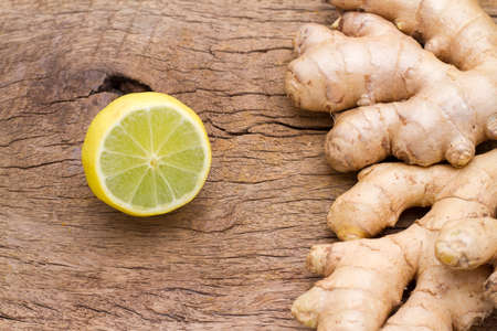 ginger and lemon on the table seen from aboveの写真素材