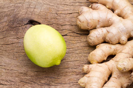 ginger and lemon on the table seen from aboveの写真素材