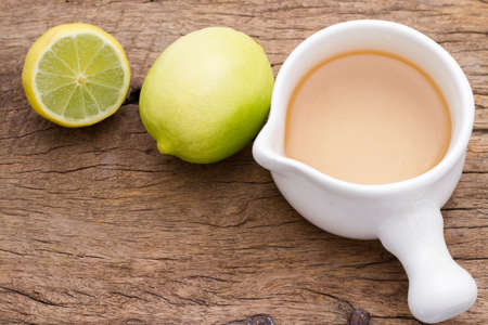 tea and lemon on the table, top viewの写真素材