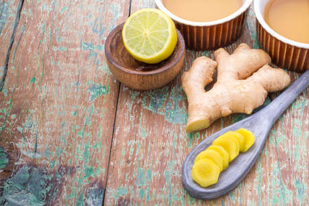 ginger and lemon on the table seen from aboveの写真素材